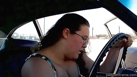 Robust Woman With Black Heels Tries Hard To Start Her Car With No Success